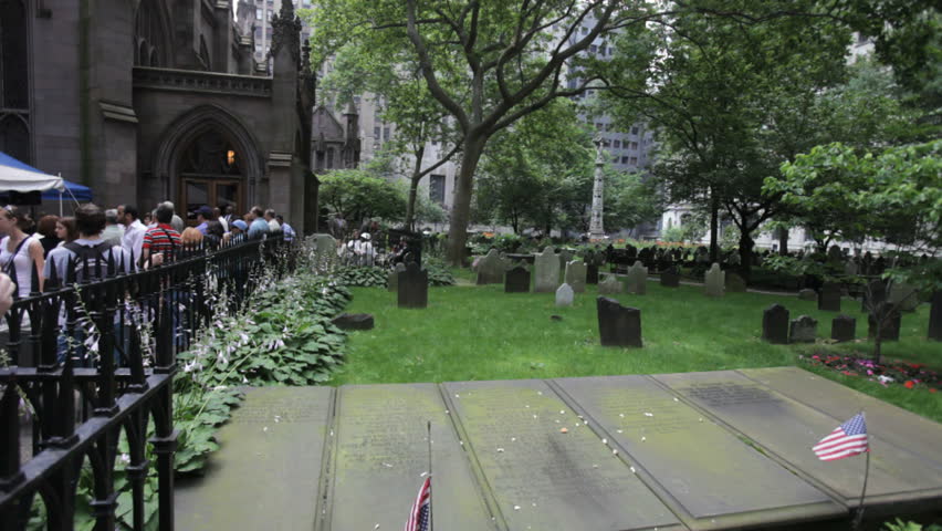New York - Circa 2009: A funeral service in 2009. Funeral services at cemetery with a band playing in background in New York City, New York.