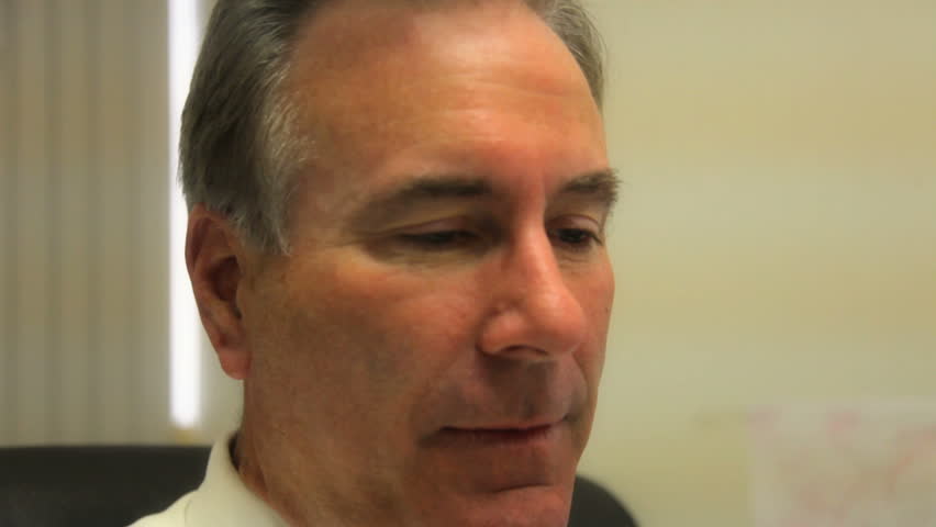 Business man showing frustration of the job