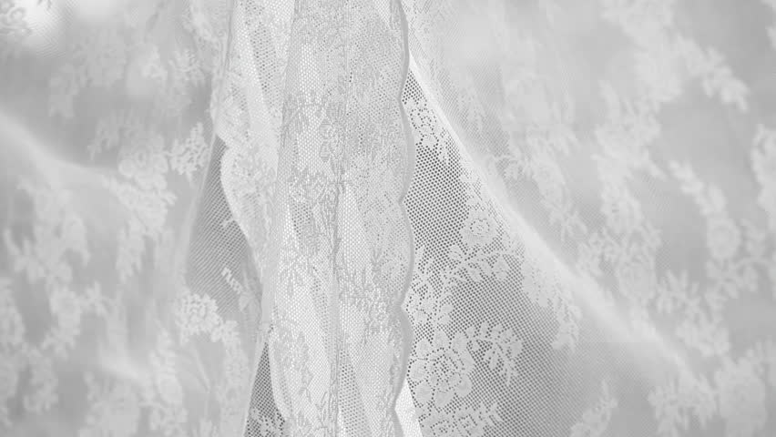 Lace curtain in the wind