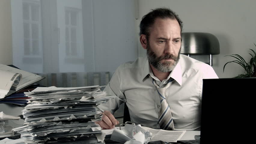 Overworked businessman - desperate
