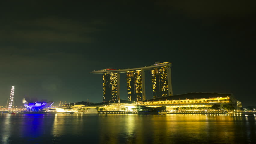 SINGAPORE - MAY 31: Time lapse of light show at Marina Bay Sands on May 31, 2012 in Singapore. Marina Bay Sands is a luxury hotel integrated with shopping mall and casino, developed by Las Vegas Sands. 