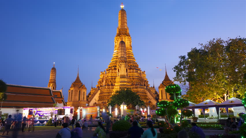 BANGKOK - APRIL 15: (Timelapse in motion view) Many tourists near Wat Arun temple on April 15, 2012 in Bangkok, Thailand.