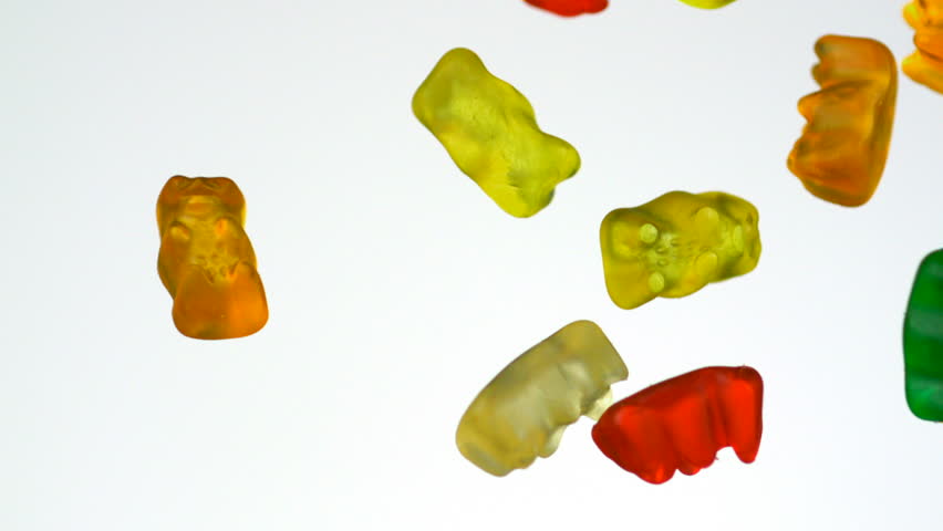 Colorful gummy bear falling in the air shooting with high speed camera, phantom flex.