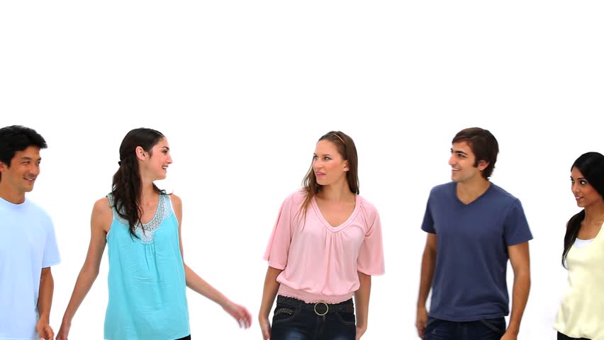Friends posing together against white background