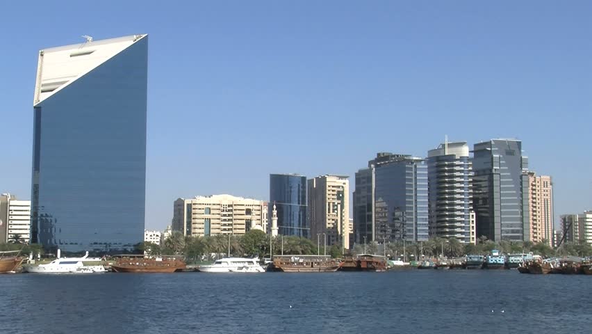 DUBAI - CIRCA 2012: View of the Dubai Chamber of Commerce as seen from the Dubai Creek in the United Arab Emirates.