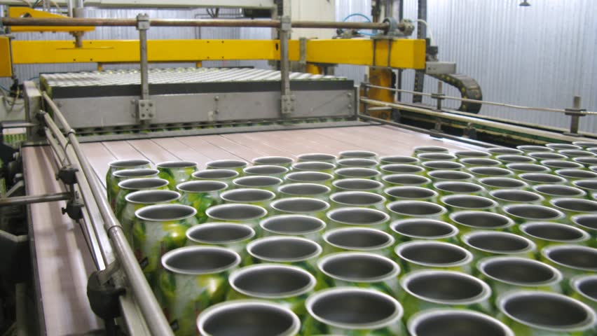 MOSCOW - MAY 16: (Timelapse View) Aluminum can with drink move on conveyor at nonalcoholic plant Ochakovo, on May 16, 2012 in Moscow, Russia