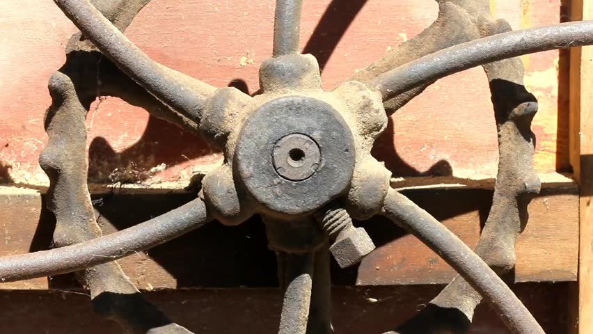 Antique Cast Iron Wheel Section Spinning And Making Noise