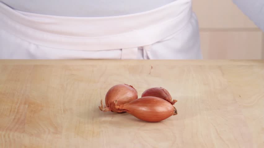 Shallots being peeled