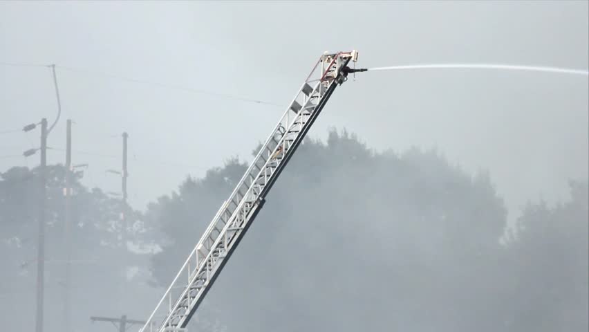 Ladder Mounted Water Cannon At Outdoor Fire In Operation