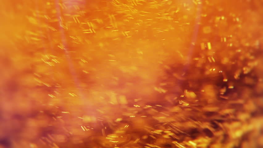 Macro clip of liquid, bubbles and froth. Abstract video that could be used as effect, transition or background and even as a conceptual video.

