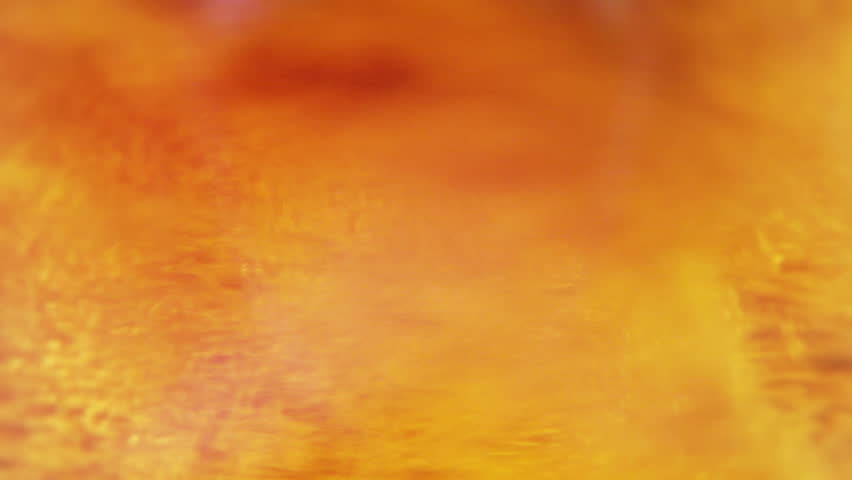 Macro clip of liquid, bubbles and froth. Abstract video that could be used as effect, transition or background and even as a conceptual video.
