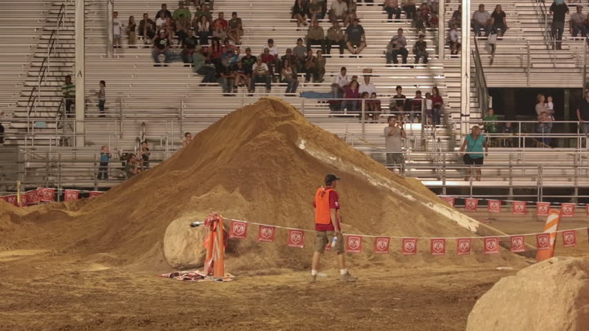 NEPHI, JUAB, UTAH JUN 2012: Economic boost to rural community in annual race. Motorcycle dirt track race sand hill. Juab County extreme enduro. difficult obstacle course with jumps, logs and rocks.