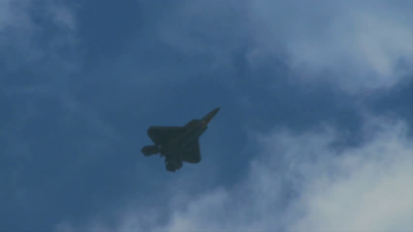QUONSET, RHODE ISLAND - JUNE 2012: Air force F-22 Raptor doing somersault at the Rhode Island National Guard Open House and Air Show in June 2012.
