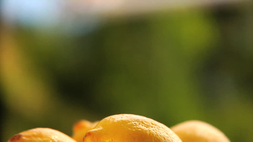 Close-up of glasses of lemonade and lemonade in pitcher