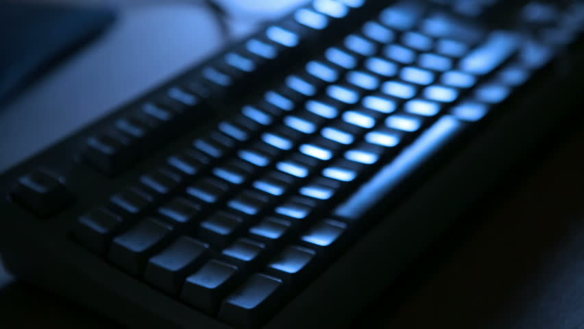 hacker close up typing on keyboard with tapping sound