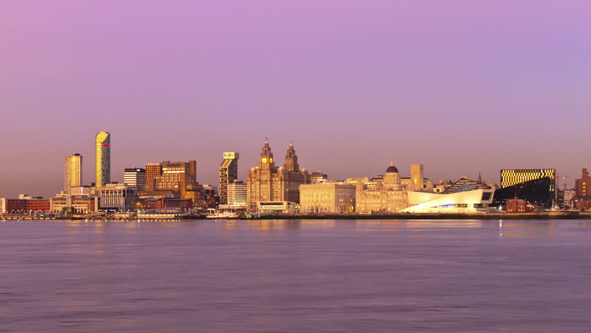 Time lapse and slow zoom of Liverpool skyline at dusk