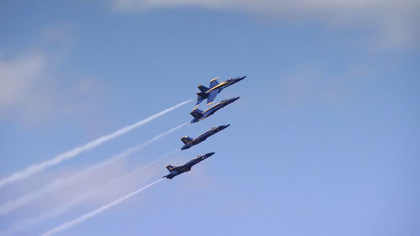 QUONSET, RHODE ISLAND - CIRCA JUNE 2012: Four Blue Angels jets breaking away one plane at a time