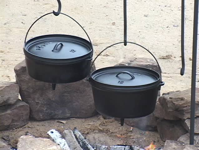 Cast iron pots over an open fire