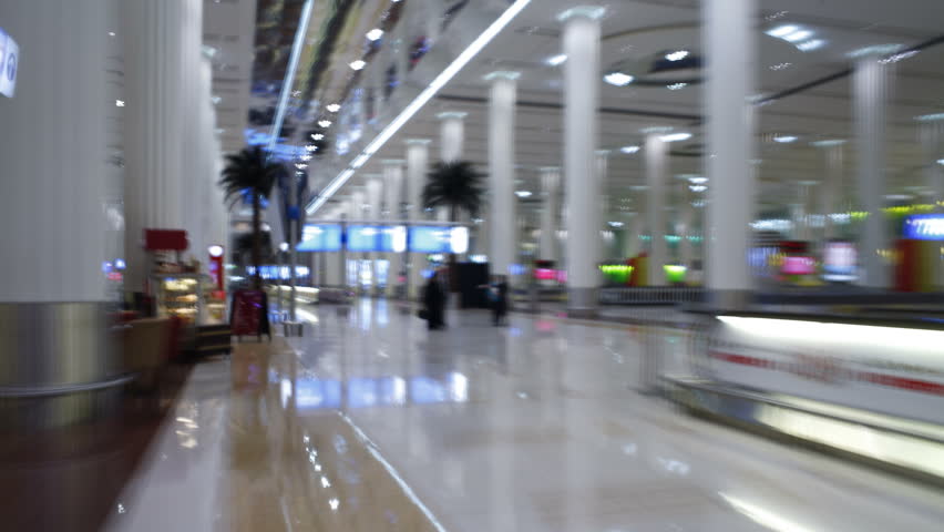 DUBAI, UNITED ARAB EMIRATES - CIRCA MAY 2011: Time lapse view around the Modern Architecture of Dubai International Airport circa May 2011 in Dubai, United Arab Emirates.