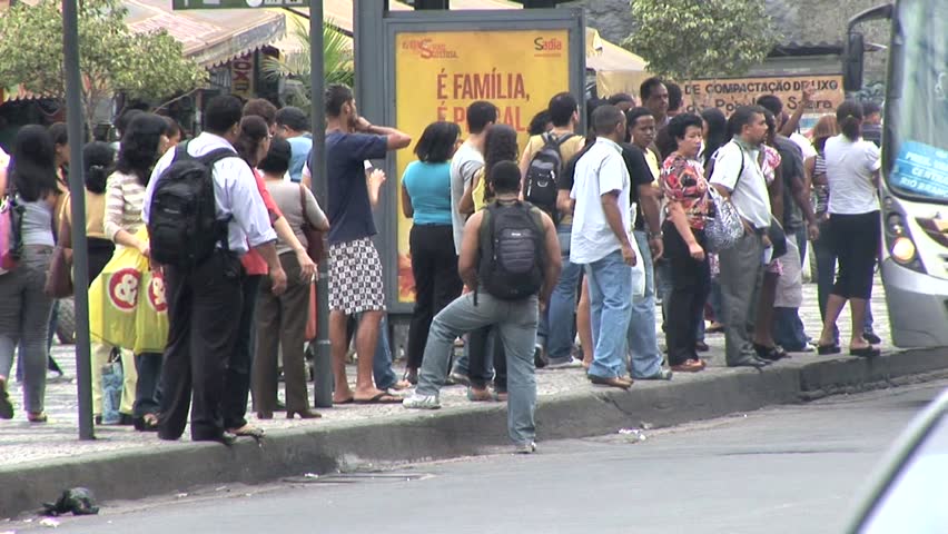 RIO DE JANEIRO, BRAZIL - CIRCA 2010: People Board A Public Bus in Rio De Janeiro, Brazil