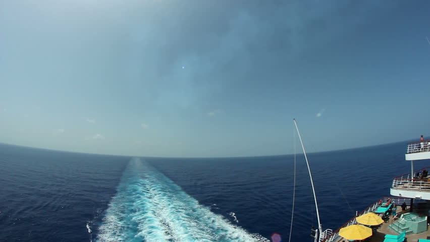 Looking off the back of a large cruise ship.