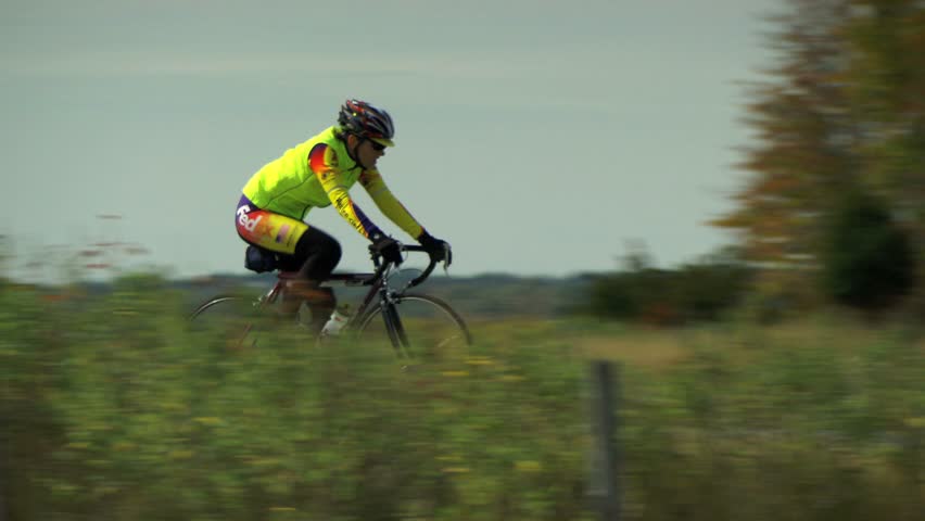 RHODE ISLAND - CIRCA NOVEMBER 2009: Bicycle racers turning sharp corner