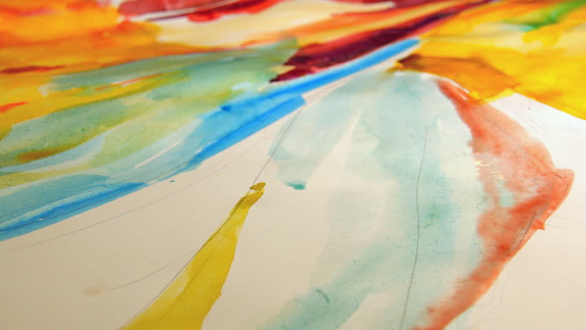 Woman artist painting watercolor paints