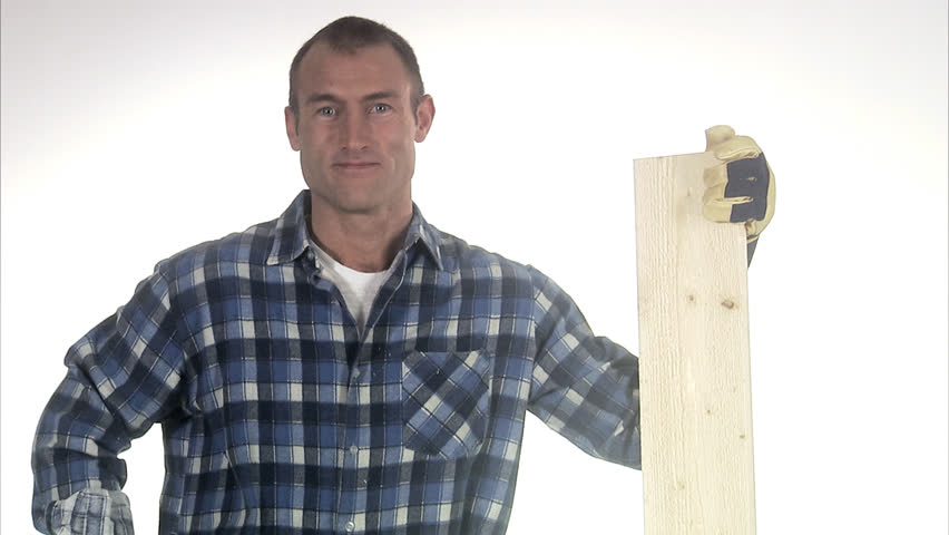 A craftsman using a folding rule.