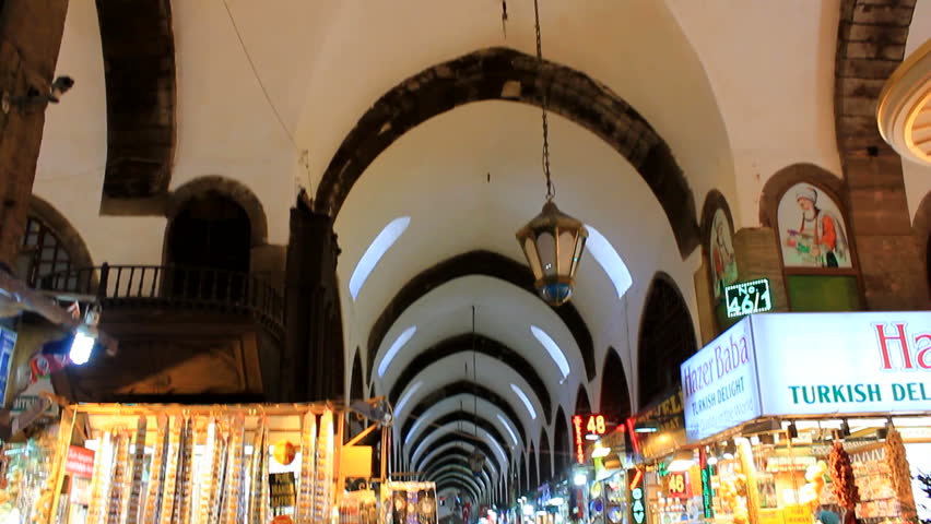 ISTANBUL, TURKEY - 26 July 2012: Shoppers and Tourists frequent the Infamous Spice Bazar during the Holy Month of Ramadan. 26 July 2012 -Istanbul, Turkey.