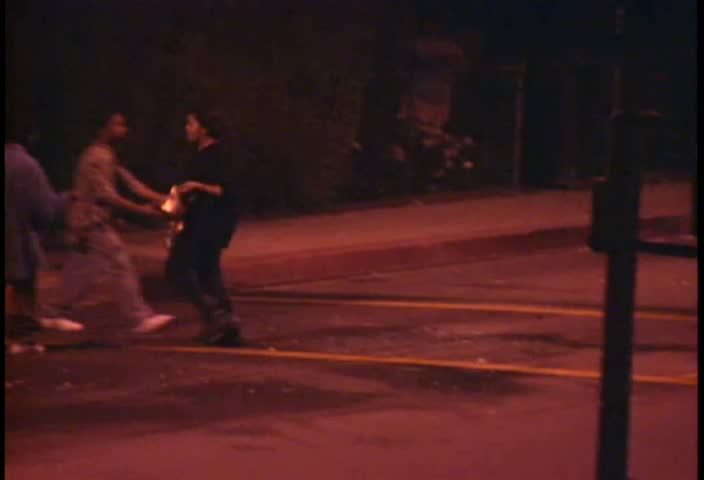 LOS ANGELES-CIRCA APRIL/MAY 1992-Looters steal things during the LA riots in 1992.