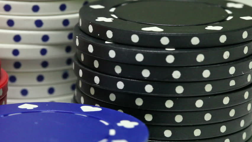 Pan over stacked casino poker chips