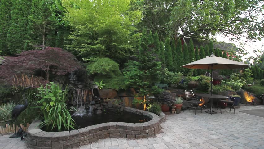 Paver Stone Garden Backyard Waterfall with Bistro Furniture and Umbrella 1080p