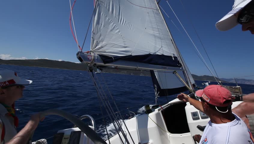 MEDITERRANEAN SEA, TURKEY - MAY 29: Sailors participate in sailing regatta "Sail & Fun Trophy 2012" on May 29, 2012 on Mediterranean Sea, Turkey.