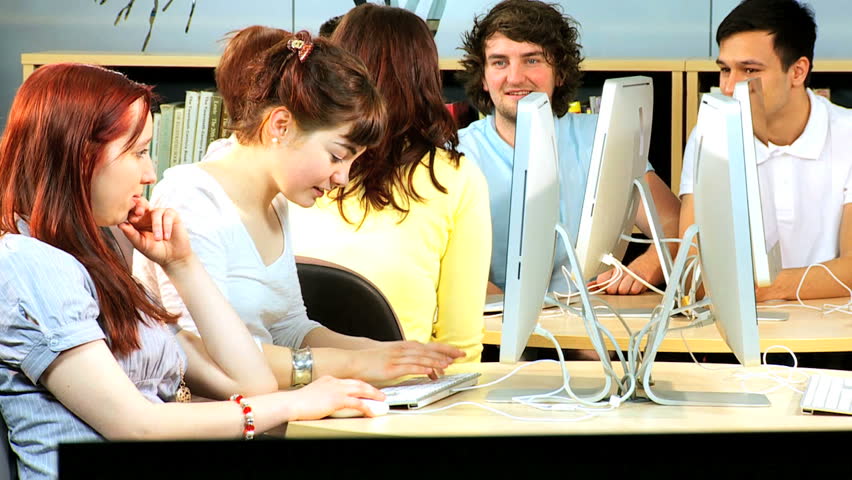Caucasian female tutor and young college diverse students e-learning online education system