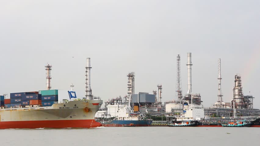 BANGKOK - AUGUST 18: General cargo ship brings containers along the Chao Phraya River for export to foreign countries on August 18, 2012 in Bangkok, Thailand.