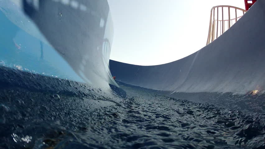 Sliding down water slideRide on the waterslide POV