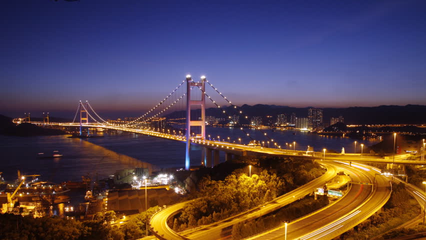 Time lapse of Tsing Ma Bridge at night  ( tilt down ) - Tsing Ma Bridge is a bridge in Hong Kong. It is the world's seventh-longest span suspension bridge.