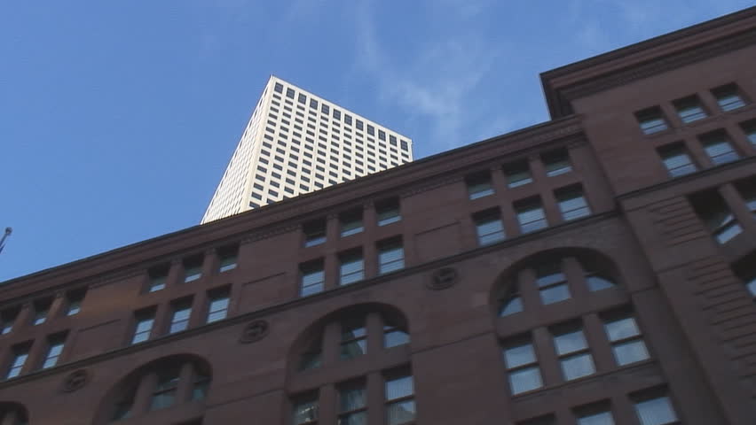 Multiple low angle tracking shots of Denver highrise office buildings 