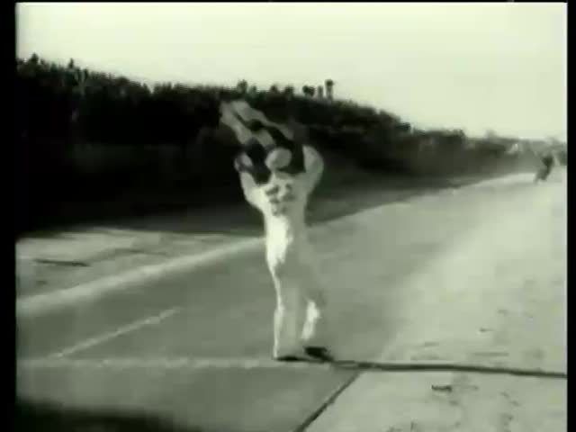 Joe Leonard wins Daytona 200, a 200-mile motorcycle race, at the Daytona International Speedway in Daytona Beach, FL circa 1958-MGM PICTURES, UNIVERSAL-INTERNATIONAL NEWSREEL, USA, filmed in 1958