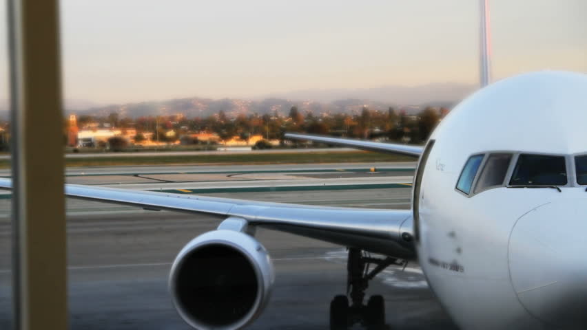 Airplane on Tarmac At Airport