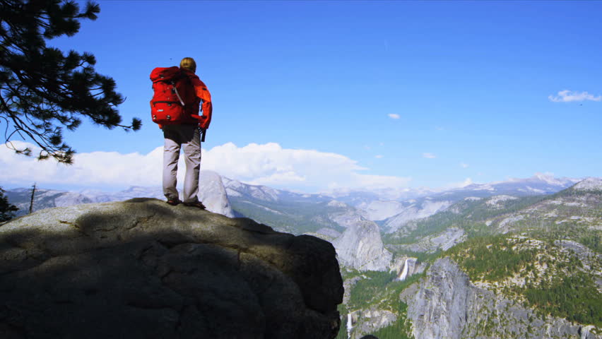 Female enjoying the satisfaction of achieving her ambitions, Yosemite, National Park, USA, Shot on Red Epic