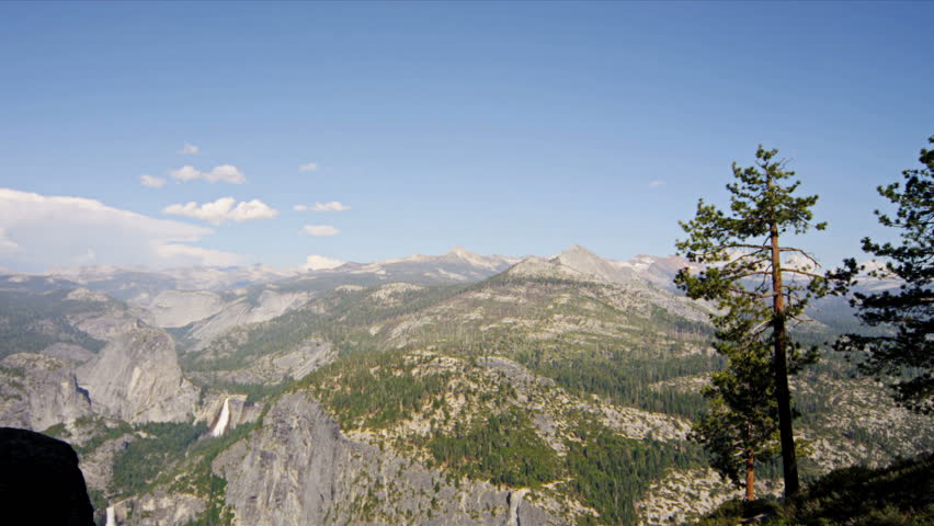 Lone female hiker viewing the majestic landscape, Shot on Red Epic