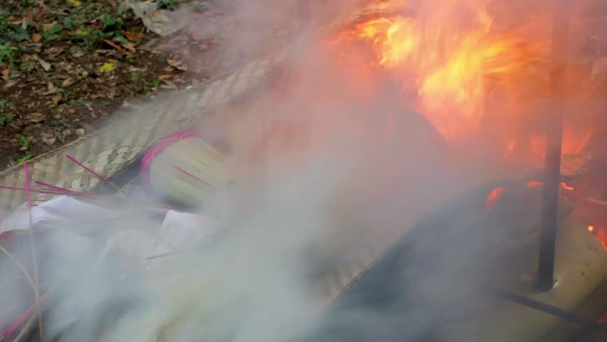 a shot of burning dead body in Balinese funeral, Bali, Indonesia