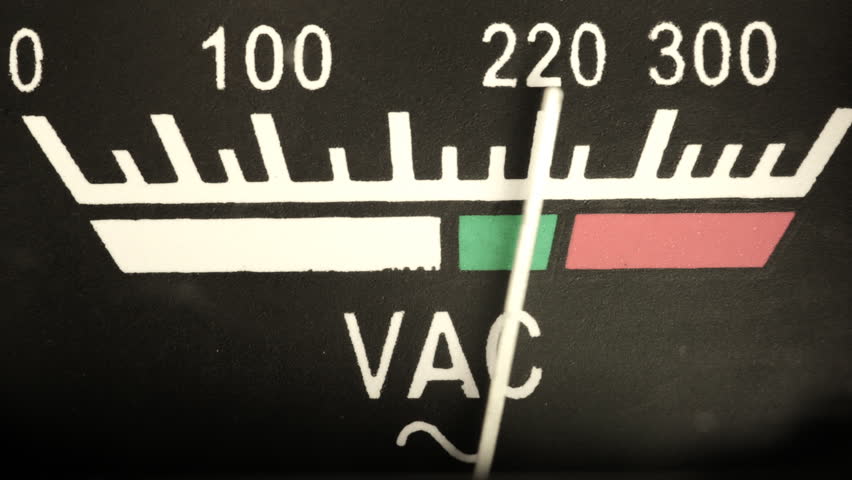 Vintage analog volt meter close up
