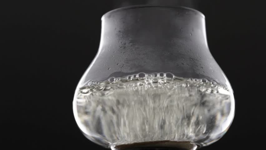 Water boiling in glass carafe
