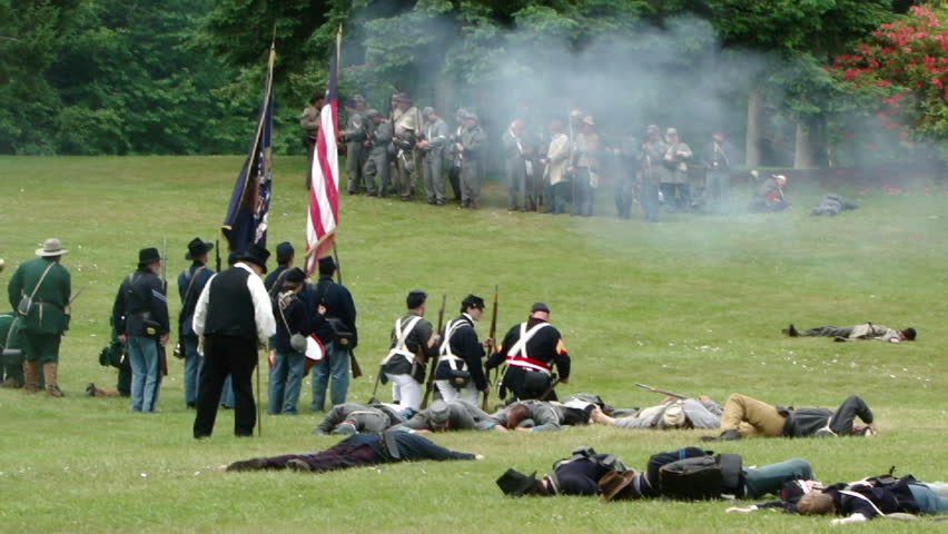 PORT GAMBLE, WA - JUN 20, 2009:  Union and Confederate infantry trade fire, and the wounded of both sides are cared for, 	in a mock battle at Port Gamble WA on Jun 20, 2009.
