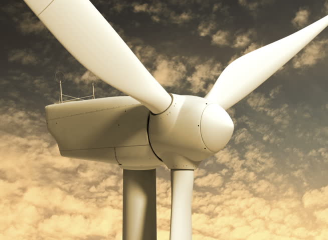 PAL - A windmill wind turbine turns on golden time lapse clouds (Loop).