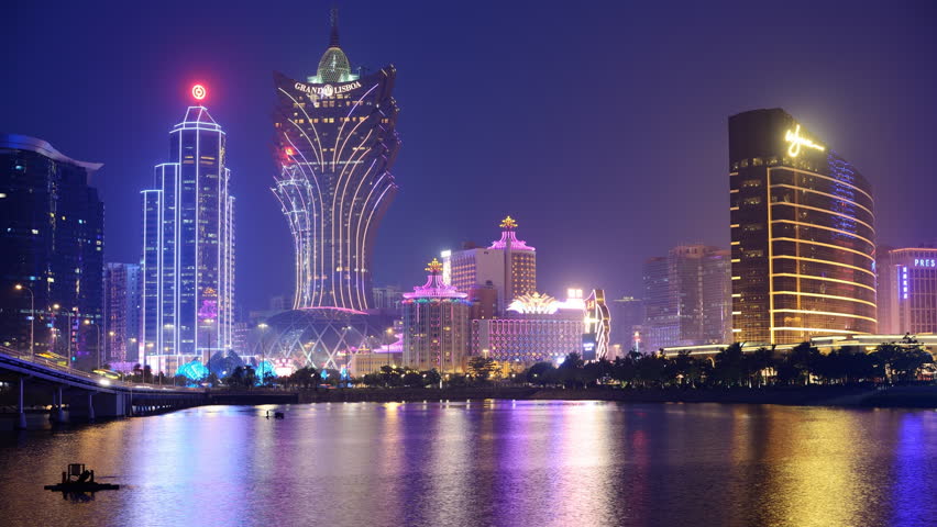 MACAU - OCTOBER 12: Skyline of resort casinoas at Nam Van Lake October 12, 2012 in Macau, China. The city maintains the world's highest gambling revenue with over 20 million tourists annually.
