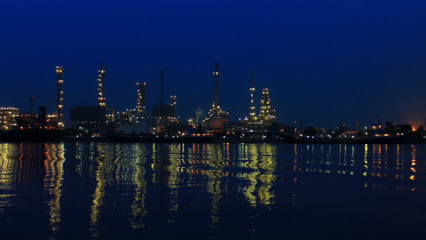 refinery alongside the river time lapse
