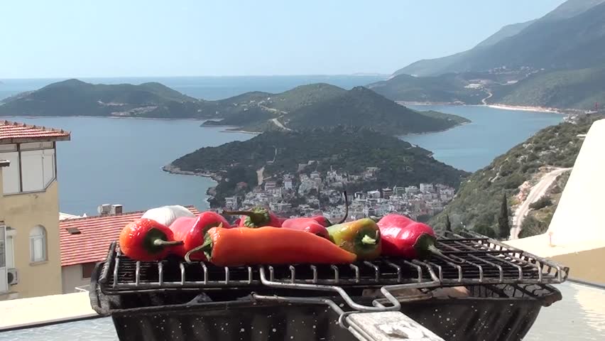 Vegetables on grill, bbq on a balcony, breath-taking panorama